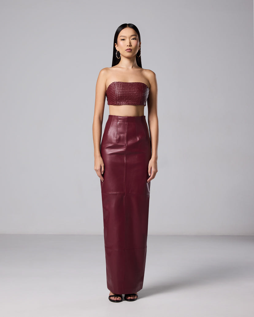 Burgundy leather maxi skirt styled with a matching woven bandeau top