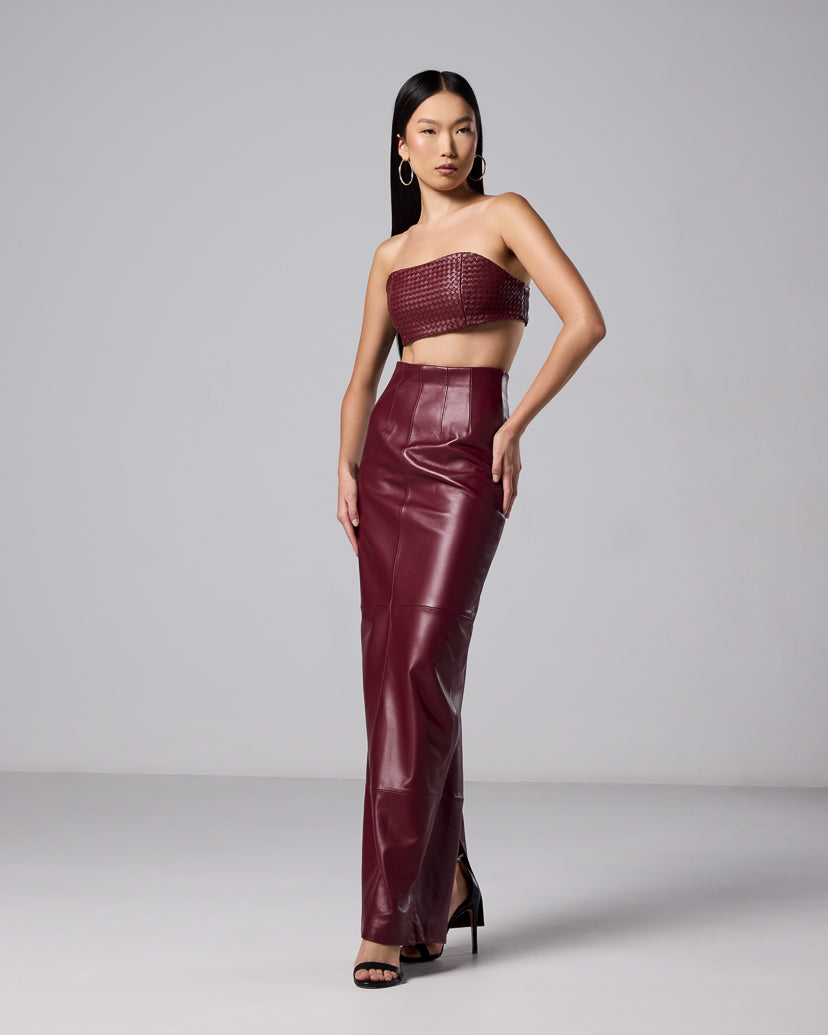 Burgundy leather maxi skirt styled with a matching woven bandeau top