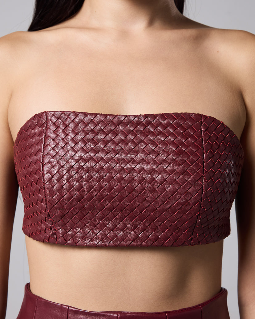 Close-up of the burgundy woven leather bandeau top