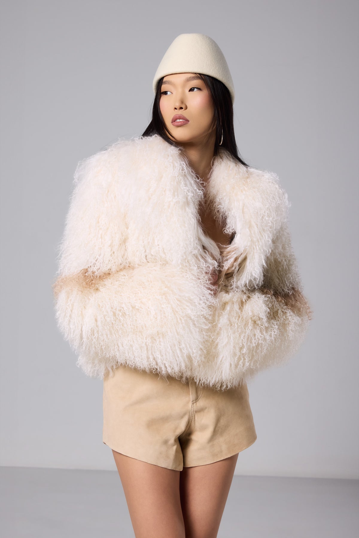 Nola ivory Mongolian fur jacket with a warm brown stripe and round neckline, photograph 6866