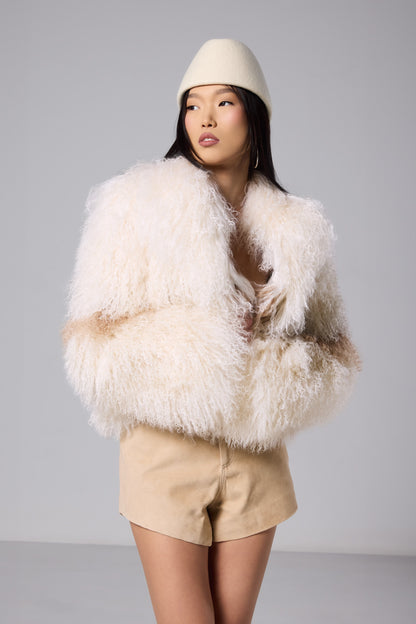 Nola ivory Mongolian fur jacket with a warm brown stripe and round neckline, photograph 6866